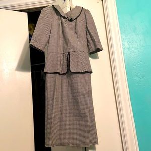 Old fashioned short sleeve peplum styled Dress